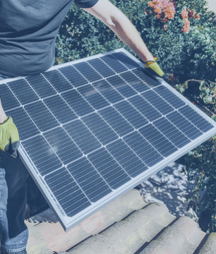 A solar panel being installed, symbolizing the energy sector where FiberElectronics provides durable connectivity for renewable infrastructure.