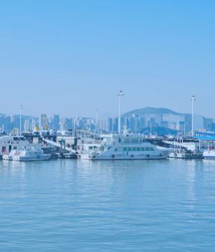 A harbor with boats, representing marine and offshore industries that rely on FiberElectronics' ruggedized assemblies for harsh conditions.